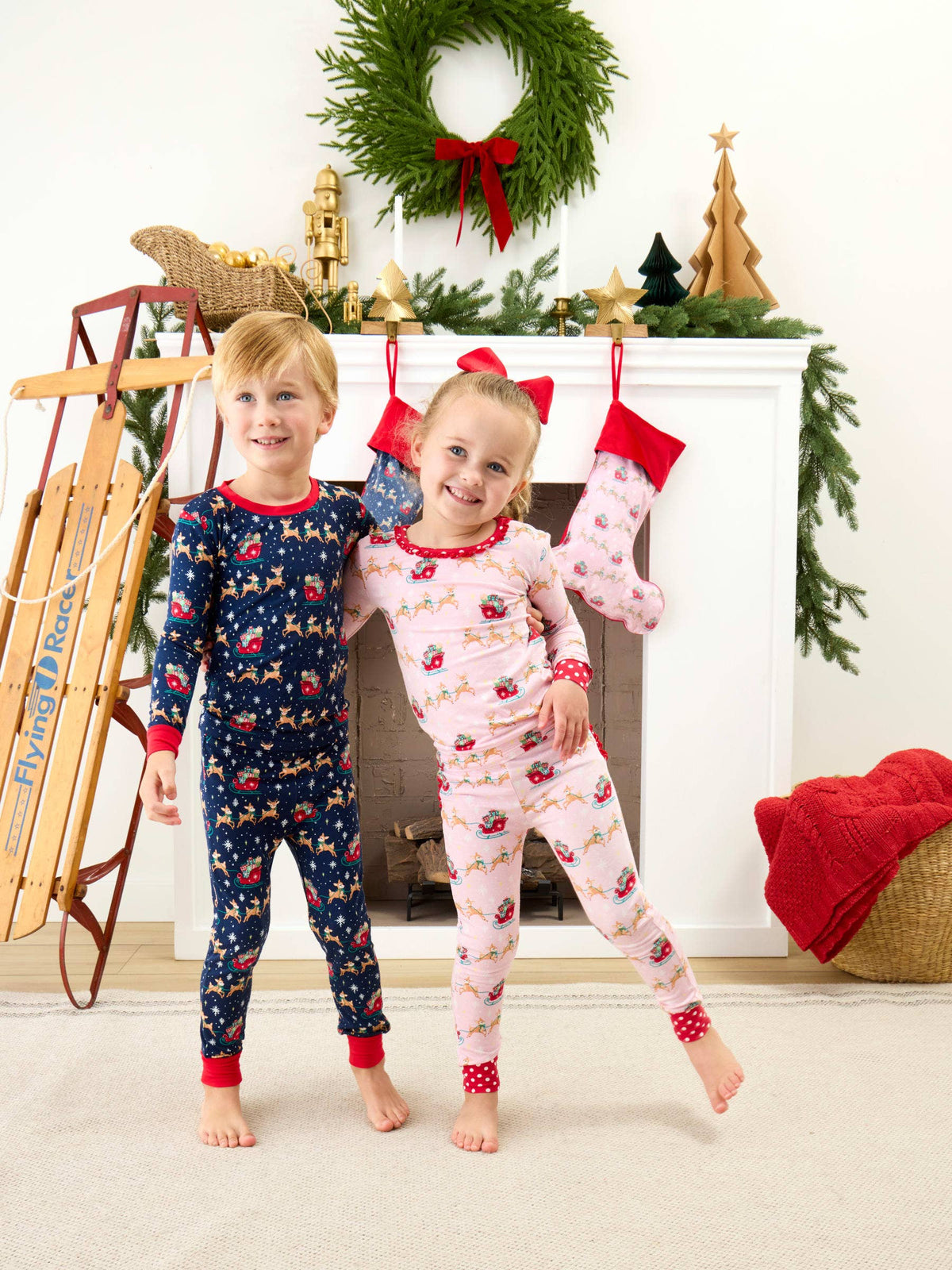 SoftSnooze™ Toddler Girls Bamboo Viscose Pink Christmas Reindeer Sleigh Ride Ruffle Long Sleeve Pajama Set with Signature Rear Ruffles: Pink / 2T