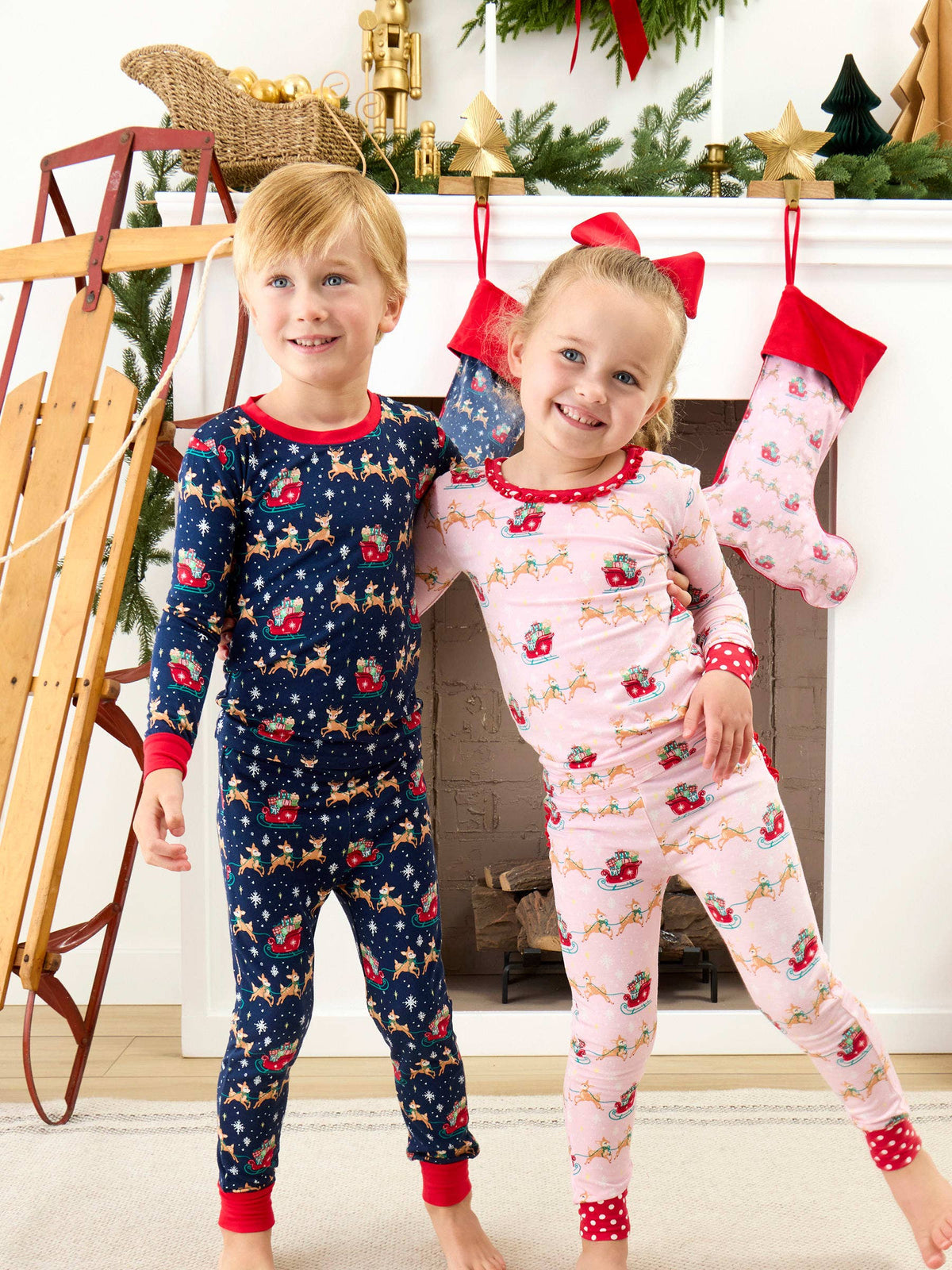 SoftSnooze™ Toddler Girls Bamboo Viscose Pink Christmas Reindeer Sleigh Ride Ruffle Long Sleeve Pajama Set with Signature Rear Ruffles: Pink / 2T