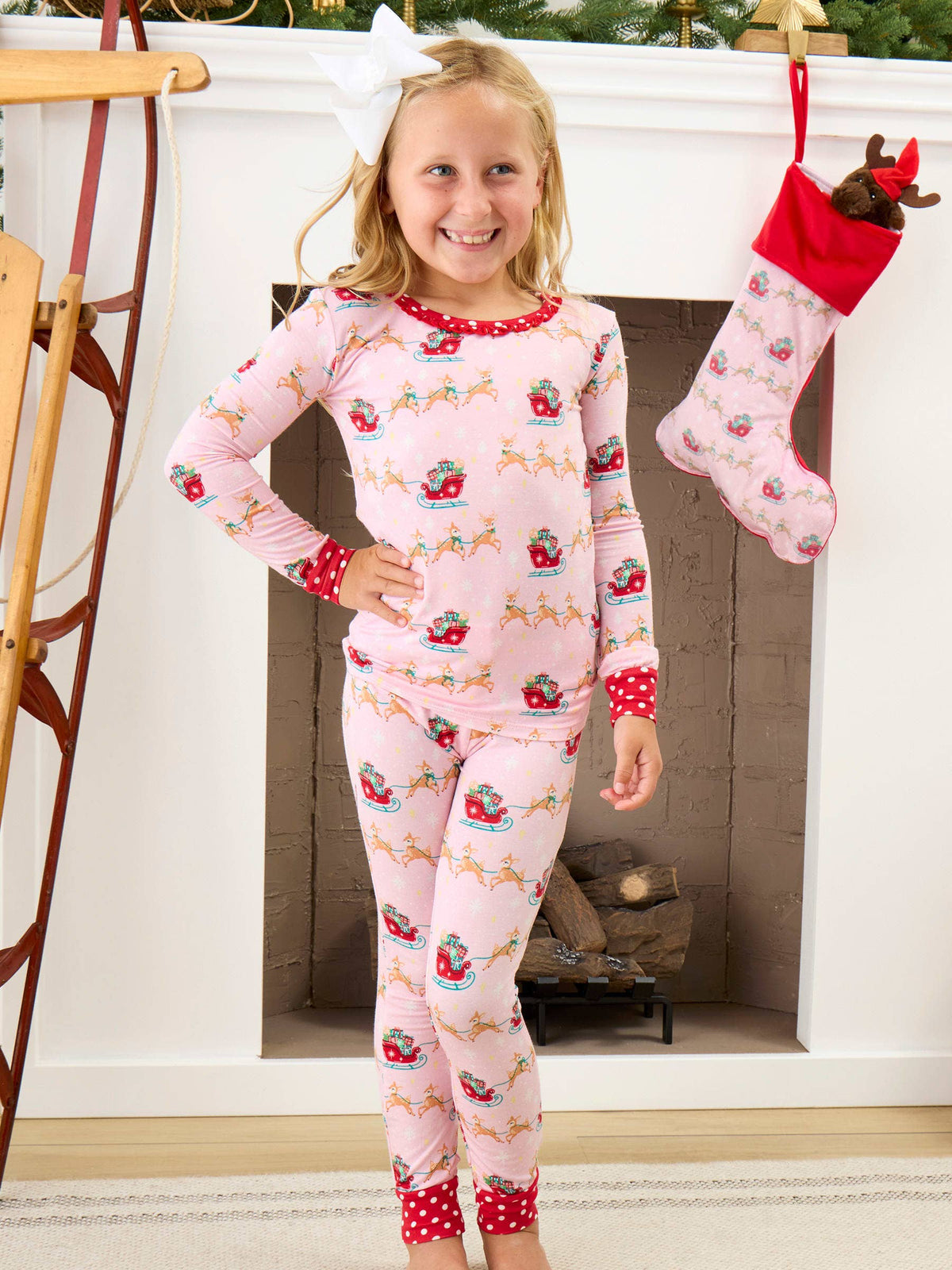SoftSnooze™ Girls Bamboo Viscose Pink Christmas Reindeer Sleigh Ride Ruffle Long Sleeve Pajama Set: Pink / 7/8
